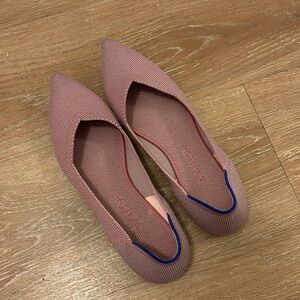 Pink Rothy pointed flats
